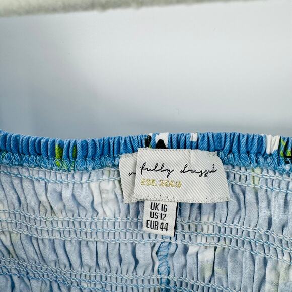 Never Fully Dressed Blue Smocked Puff Sleeve Midi Dress Floral Ruffle Hem 12 - Picture 3 of 10